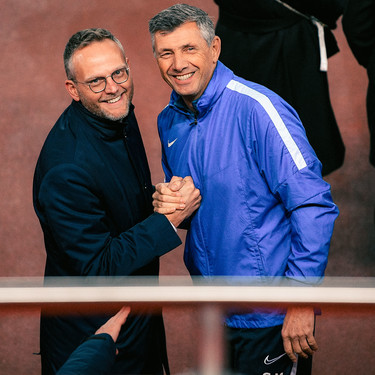 Genk's chairman Peter Croonen and Genk's goalkeeper coach Guy Martens pictured during a training session of Belgian soccer team KRC Genk, Monday 04 November 2019 in Liverpool, United Kingdom, in preparation of tomorrow's match against English club liverpool FC in the group stage of the UEFA Champions League. BELGA PHOTO YORICK JANSENS