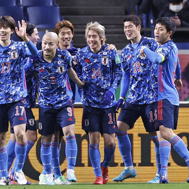 Football: Japan-China World Cup qualifier Junya Ito (3rd from R) is congratulated by his teammates after scoring Japan