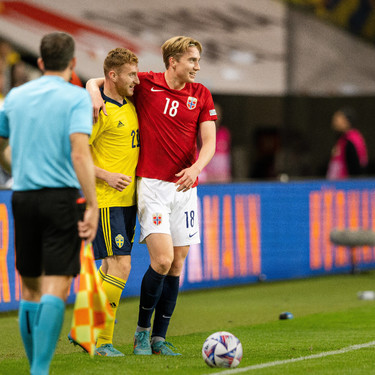 220605 Dejan Kulusevski of Sweden and Kristian Thorstvedt of Norway during the Nations League football match between Sw